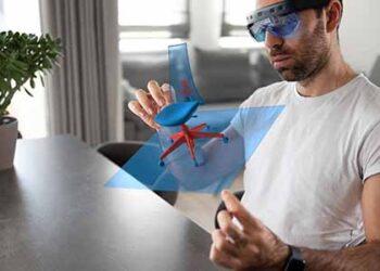 Designer wears virtual reality glasses